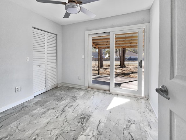 unfurnished room with ceiling fan