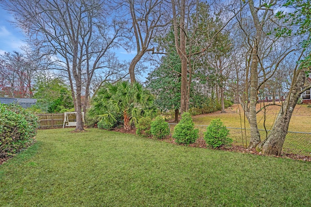 view of yard with fence