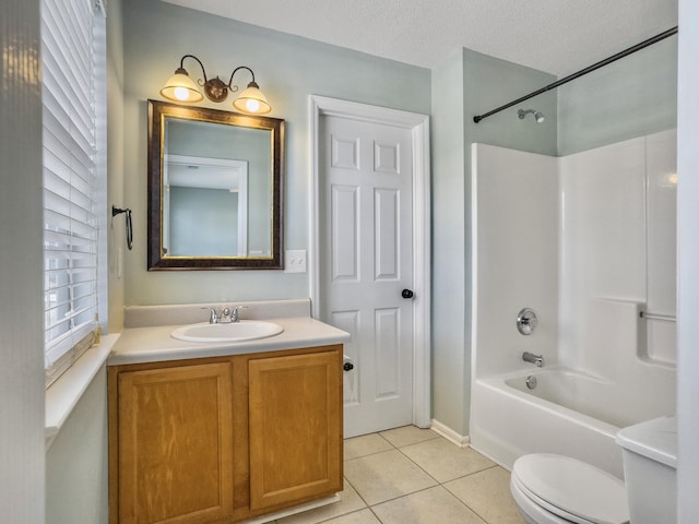 full bathroom featuring vanity, a textured ceiling, shower / bathing tub combination, tile patterned flooring, and toilet