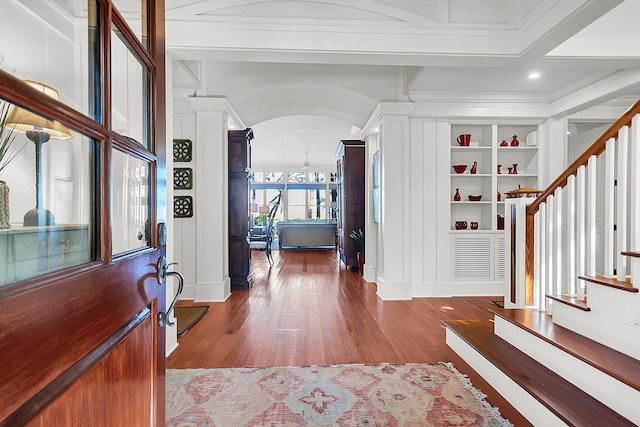 foyer entrance with hardwood / wood-style floors