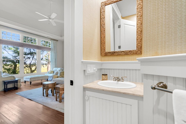 bathroom featuring vanity, wood-type flooring, and ceiling fan