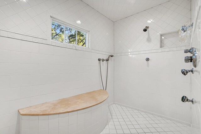 bathroom with a tile shower