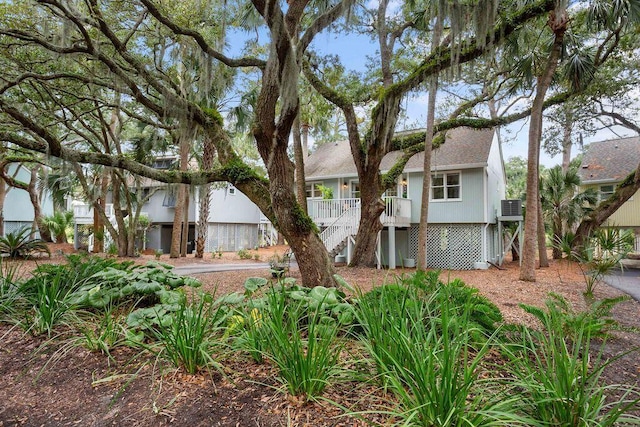 view of front of home with a wooden deck