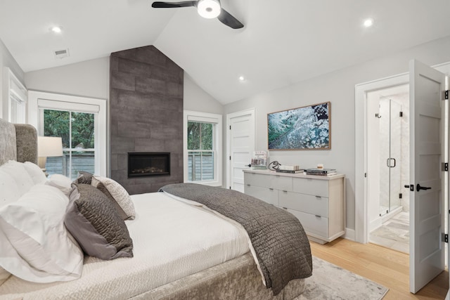 bedroom with vaulted ceiling, recessed lighting, access to exterior, light wood finished floors, and visible vents