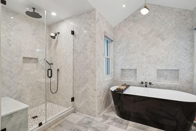bathroom featuring a soaking tub, tile walls, and a shower stall