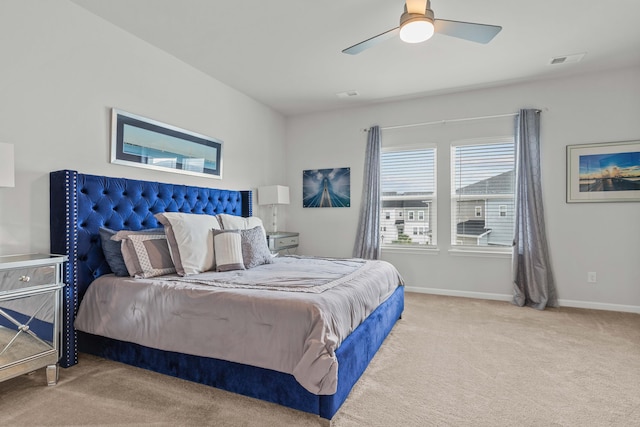 carpeted bedroom with ceiling fan