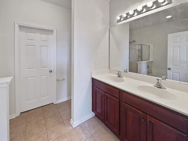 bathroom with plus walk in shower, vanity, and tile patterned floors