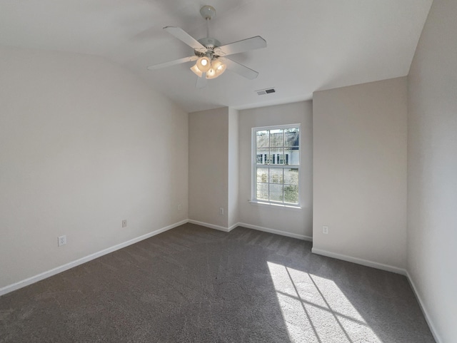 136 Winding River Dr, Johns Island, SC 29455 - empty room featuring dark colored carpet, a ceiling fan, vaulted ceiling, and baseboards