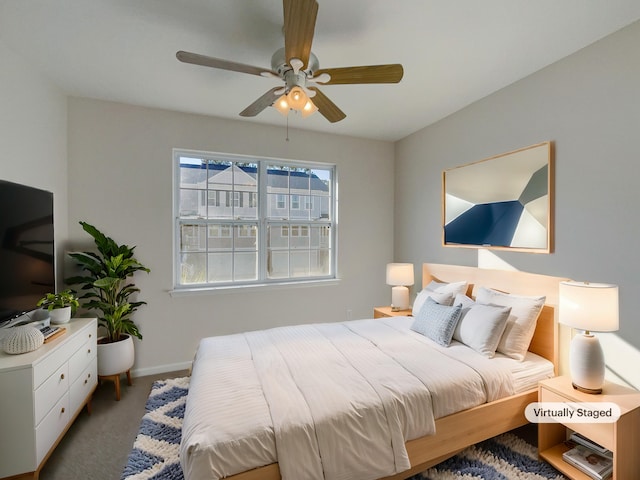 carpeted bedroom featuring ceiling fan