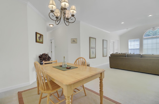 carpeted dining area with ornamental molding, vaulted ceiling, and a notable chandelier