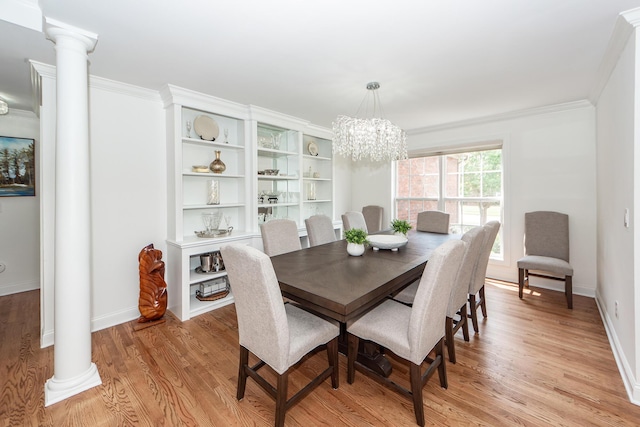 dining space featuring baseboards, light wood-style floors, ornate columns, and crown molding