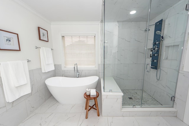 full bathroom with crown molding, a freestanding tub, marble finish floor, and a marble finish shower