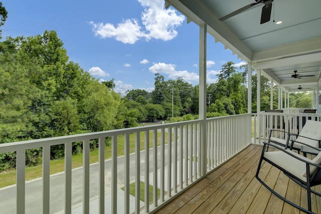 wooden deck with ceiling fan