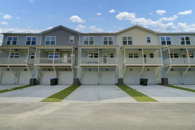 townhome / multi-family property with central AC and ceiling fan