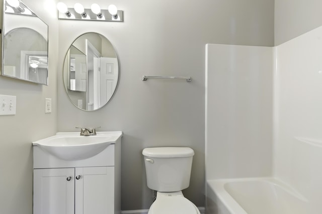 full bathroom with vanity, toilet, and shower / washtub combination