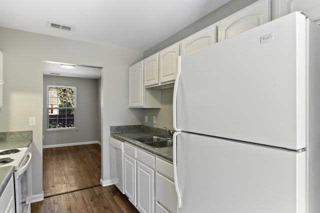 kitchen with white cabinets, white appliances, dark wood-type flooring, and sink