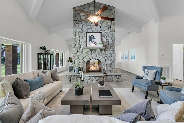 1085 Harts Bluff Rd, Wadmalaw Island, SC 29487 - living room with beamed ceiling, a fireplace, healthy amount of natural light, a ceiling fan, and high vaulted ceiling