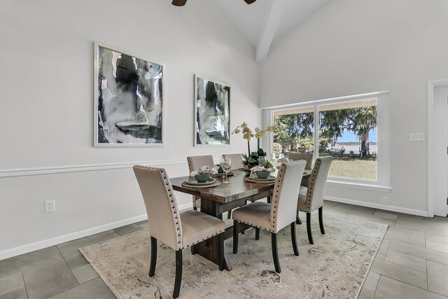 1085 Harts Bluff Rd, Wadmalaw Island, SC 29487 - dining space with ceiling fan, tile patterned floors, and high vaulted ceiling