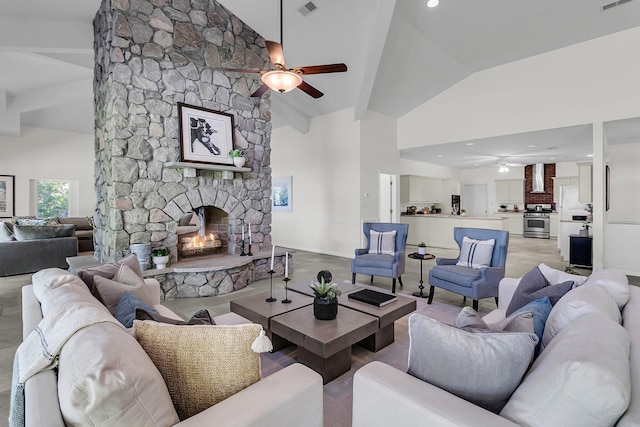 1085 Harts Bluff Rd, Wadmalaw Island, SC 29487 - living area featuring a ceiling fan, a fireplace, and high vaulted ceiling