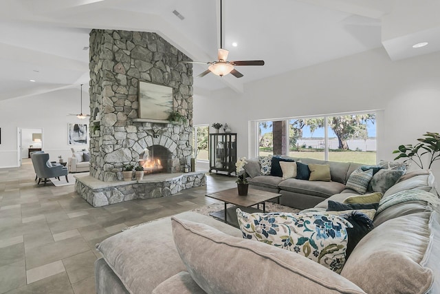 1085 Harts Bluff Rd, Wadmalaw Island, SC 29487 - living room with a ceiling fan, high vaulted ceiling, and a fireplace