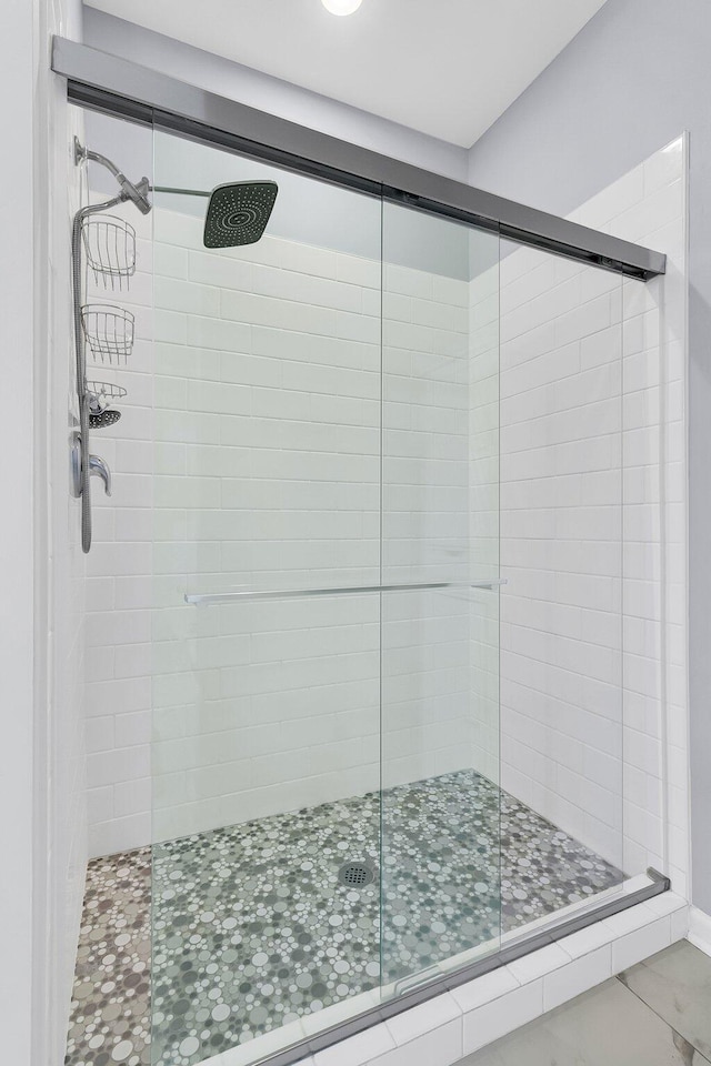 full bathroom with a stall shower
