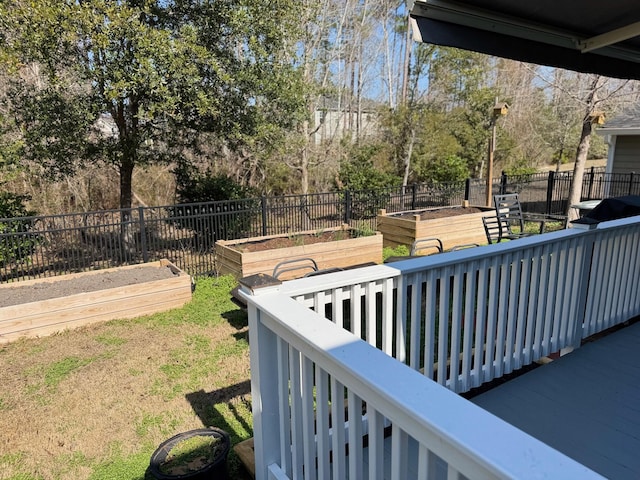 view of yard with a garden and fence