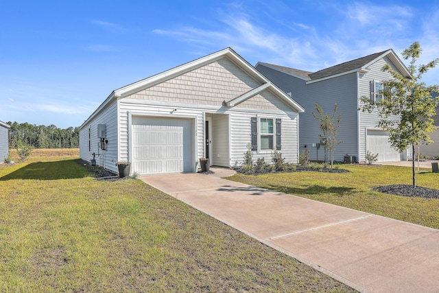 view of front of house with central AC unit, a garage, and a front lawn