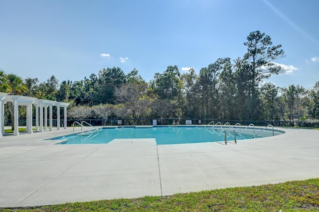 community pool featuring a patio and a pergola