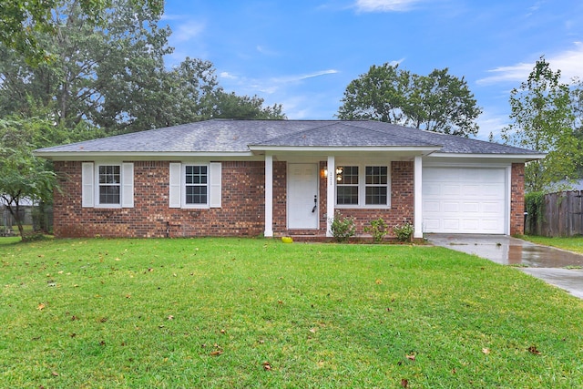 ranch-style house with a front yard and a garage