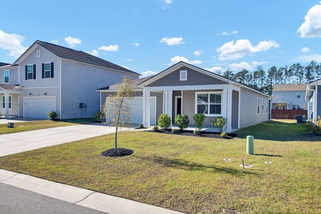 view of front facade featuring a front yard and a garage