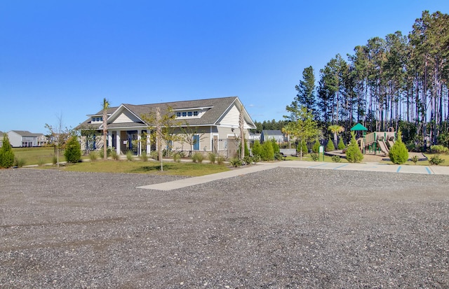 view of front of house with a playground