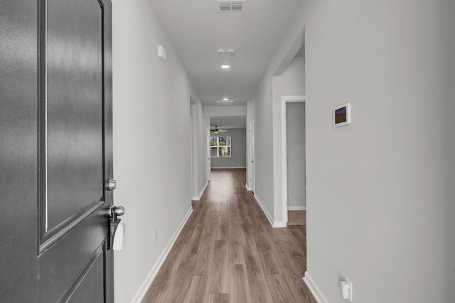 hall featuring light hardwood / wood-style flooring