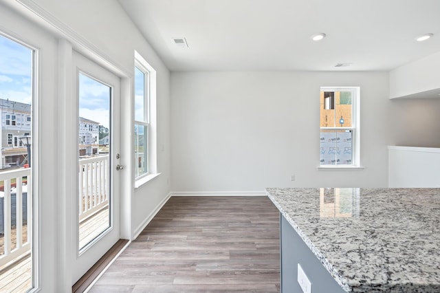 dining room with hardwood / wood-style floors