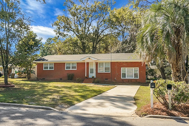 ranch-style home with a front yard