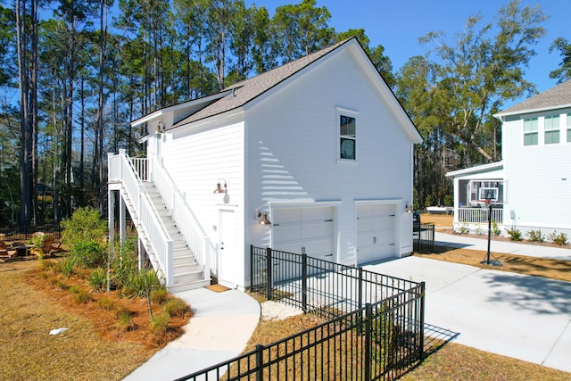 view of property exterior with a garage