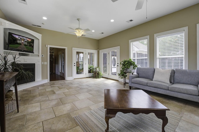 living room with recessed lighting, visible vents, and ceiling fan