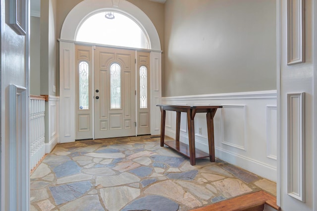 entrance foyer featuring a high ceiling