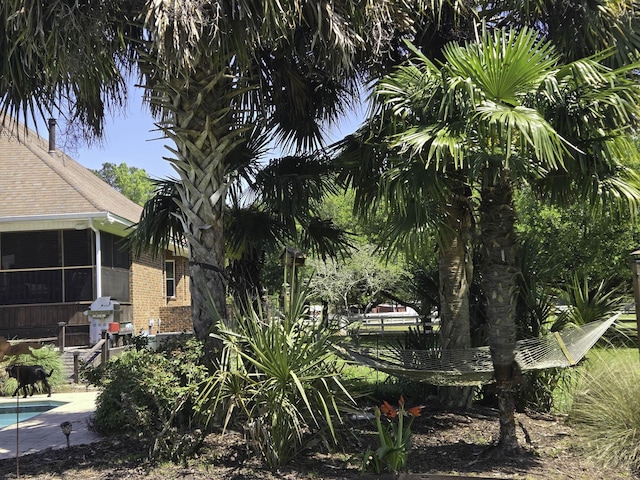 view of yard with an outdoor pool