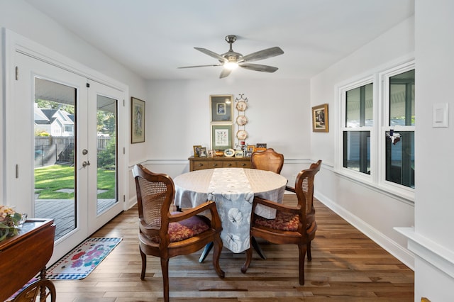 dining area featuring french doors, ceiling fan, and dark hardwood / wood-style flooring