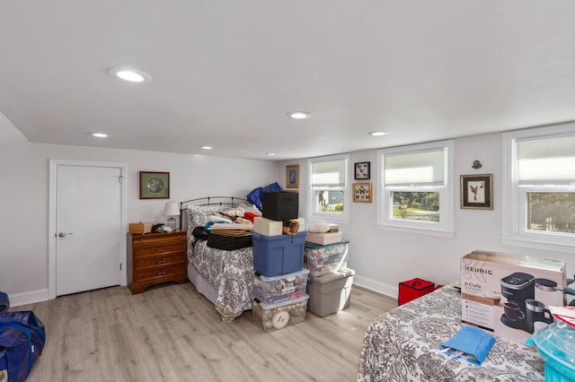 bedroom featuring light wood-type flooring