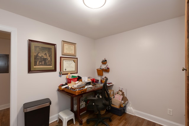 office space with hardwood / wood-style floors