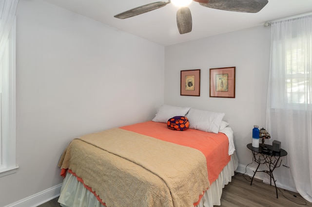 bedroom featuring ceiling fan and wood-type flooring