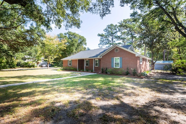 ranch-style house with a front yard