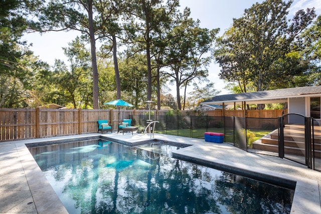 view of pool featuring a patio