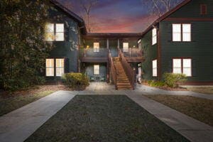 view of front of home featuring stairway