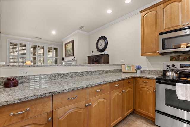 kitchen with stainless steel appliances, ornamental molding, light stone counters, recessed lighting, and light tile patterned flooring