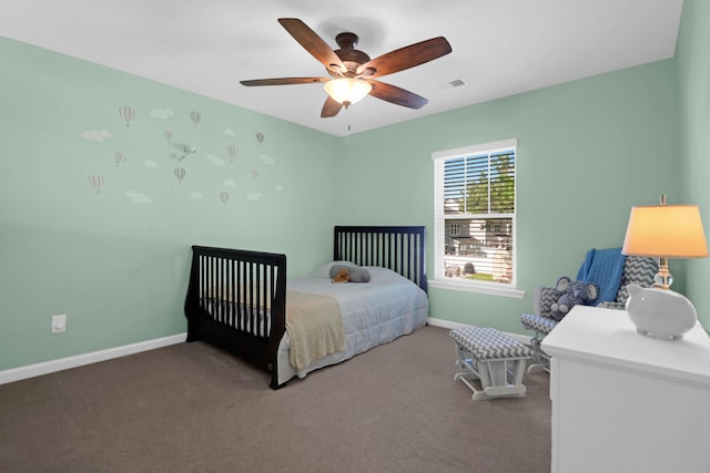 carpeted bedroom with ceiling fan