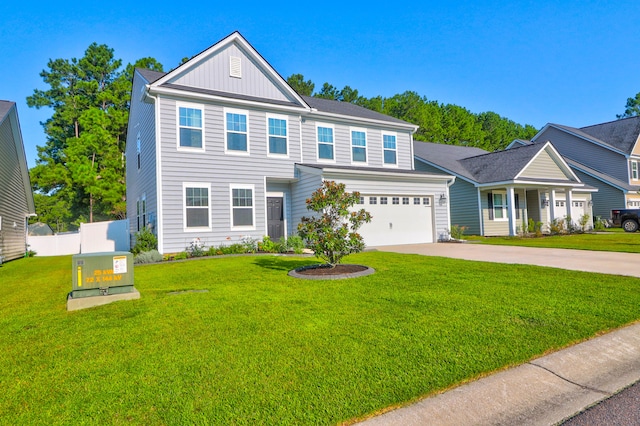 view of front of home featuring a garage and a front yard