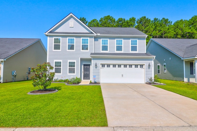 view of front facade with a garage and a front lawn