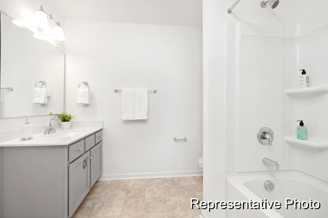 full bathroom with vanity, bathing tub / shower combination, and toilet